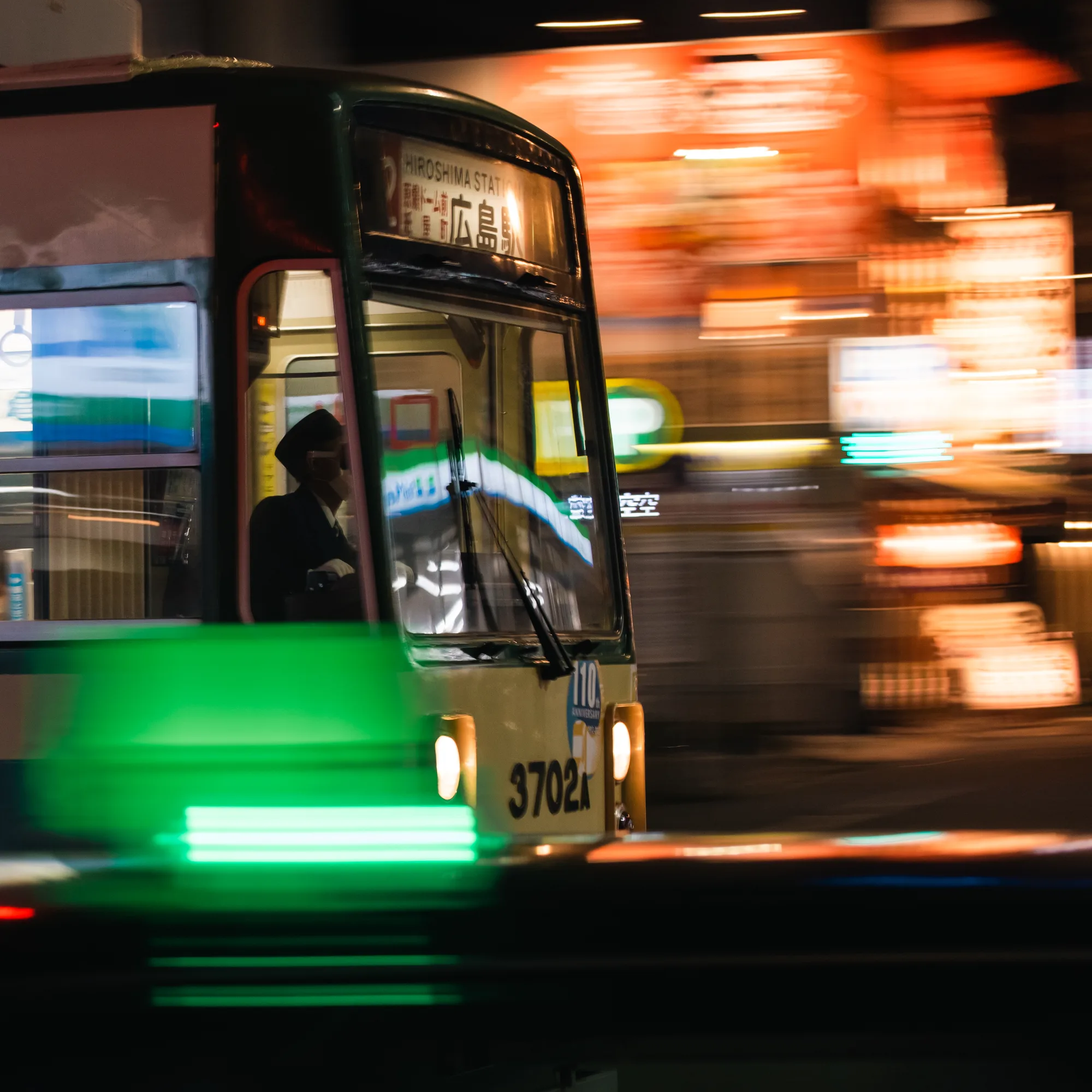Tram going down street in Hiroshima, Japan